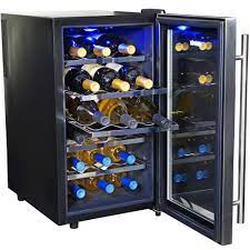 Check spelling or type a new query. Newair Single Zone 18 Bottle Compact Freestanding Wine Cooler Fridge With Quiet And Vibration Free Operation Stainless Steel Aw 181e The Home Depot Thermoelectric Wine Cooler Wine Cooler Fridge Wine Cooler