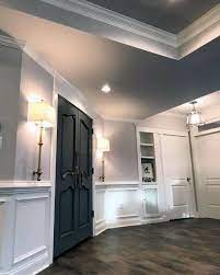 A close up view of a chair rail wainscoting in a hallway. Top 70 Best Chair Rail Ideas Molding Trim Interior Designs