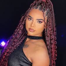 Trenzas africanas K.C added a new...