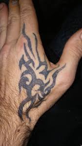 Tattoos on neck can be simple tattoo ideas but aztec tribal sun tattoo design around the neck make it perfect. Men S Hand Tattoo Not Finished Hand Tattoos For Guys Hand Tattoos Simple Tribal Tattoos