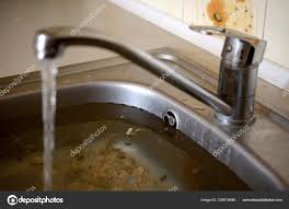 stainless steel sink plug hole close up