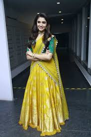 Advaitha date of birth/age : Krithi Shetty Stuns In A Yellow Half Saree At Uppena Pre Release Event