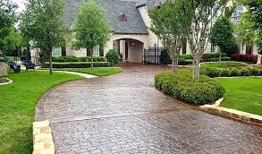 Stamped concrete offers a wide variety of patterns and textures, with some mimicking the look of brick stamped concrete supplies has several wood plank concrete stamps to transform your. Stamped Concrete Driveway Designs Ideas Concrete Craft