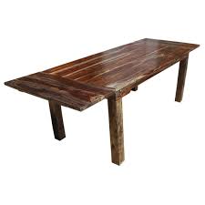 Metal corner brackets, decorative studs, and a supported pedestal base give the. Rustic Large Cariboo Extendable Dining Table