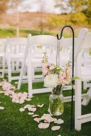 Wedding ceremony flowers, floral arrangement, white and green, eucalyptus greenery, wedding decor, backdrop & welcome sign flowers. Outdoor Wedding Ideas That Are Easy To Love Outdoor Wedding Decorations Wedding Ceremony Decorations Vintage Barn Wedding