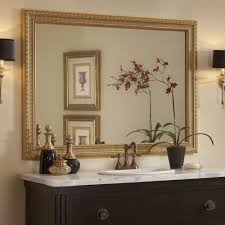 When you want to dress up a mirror by framing it, there are a couple of easy ways to do it. Affordable Custom Bathroom Mirror Frames Mirrorchic Diy Mirror Kits