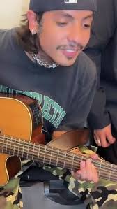 Nathan Cano Playing Guitar