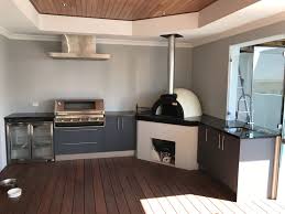Alfresco Kitchen With A Wood Fired Pizza Oven Black Pearl Granite And Eleganz Perspex Doors Modular Outdoor Kitchens Kitchen Projects Design Outdoor Kitchen