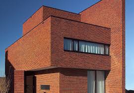 Brick apartment building with planters