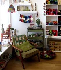 Wholecloth quilts in mineral linen. Loop London Knitting Room Yarn Shop Shop Interiors