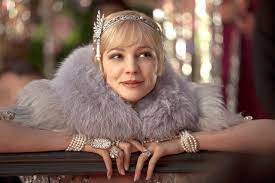 Carey mulligan as daisy, with tobey maguire, leonardo dicaprio and joel edgerton, in the great gatsby (2013). The Great Gatsby Carey Mulligan Says She Didn T Love Her Performance Ew Com