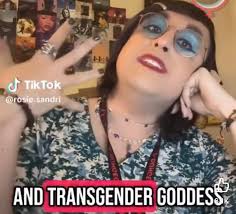 Meet Zachary Sandri, a man pretending to be a woman. Zachary is a teacher.  He says he gets gender euphoria from being called ma'am and feels affirmed  when his students use his