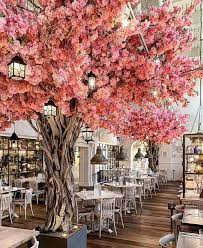 With The Smell Of Fresh Flowers Hitting You As You Arrive And Floral Decor Across The Restaurant Restaurant Interior Design Restaurant Design Restaurant Decor