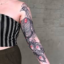Black bird tattoos on beautiful woman. 33 Adorable Bird Tattoo Designs With Meanings
