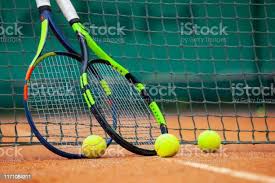 Tennis Rackets And Balls Leaned Against The Net Stock Photo Download Image Now Istock