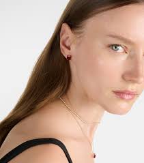 18kt rose gold earrings with rubies in gold