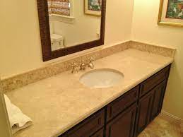 A travertine bathroom backsplash may be just the thing your bathroom renovation needs. Vanity Backsplash To Match Travertine Accent Strip In Tub Http Www Lowcountrytile Com Vanity Backsplash Bathroom Travertine