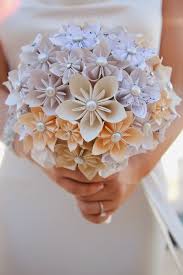 An origami wedding often appeals to the bride and groom who want to have a celebration that is memorable another common reason for incorporating origami into a wedding is the financial benefit. How To Make A Simple Origami Flower Craftsonfire Origami Flower Bouquet Easy Origami Flower Paper Flowers Wedding Bouquet