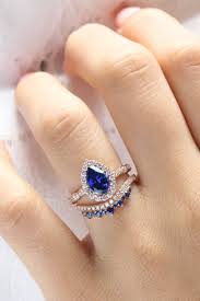 Pear Sapphire Luna Halo Bridal Ring Set By La More Design In 2020 Sapphire Wedding Ring Set Sapphire Engagement Ring Blue Blue Wedding Ring Sets
