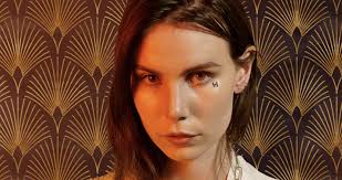 Skott explores the sound of heartache in her single "Wolf"