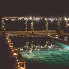 Swimming Pool Wedding Decorations Lanterns Candles Tea Lights And White Paper Lanterns Hanging De Pool Wedding Pool Wedding Decorations White Paper Lanterns