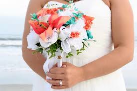 Beachy & starfish pics for wedding bouquets in coral and teal. Bouquets Beach Occasions