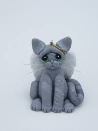 In fact, one particularly great way to choose between all the options for grey cat names is to closely study your feline sidekick's unique coat color. Gray Tabby Cat Angel Christmas Ornament Figurine Polymer Clay Etsy Grey Tabby Cats Polymer Clay Sculptures Tabby Cat
