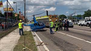 One person was killed on the ground when a helicopter crashed on a florida highway. Fhp Helicopter Crashes In Roadway Killing Truck Passenger