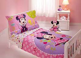 This colorful and adorable bed set combines minnie mouse and unicorns to create a dream design fit for any young girl. Amazon Com Minnie Mouse 4 Piece Toddler Bedding Set Home Kitchen