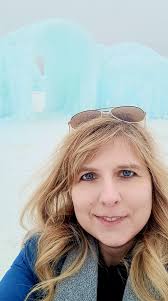 I'm at Ice Castles in Maple Grove! It opens tonight and I walked through it  today. Here's what you'll find: Ice thrones Caves Tunnels Slides Food  trucks Plenty of photo opps! Save