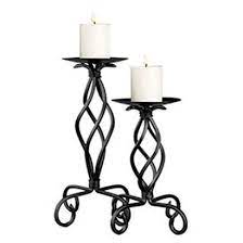 Candle & tea light holders. Wrought Iron Candle Holder Candlestick Buy Wrought Iron Candle Holder Candlestick Amber Glass Candle Holders Yellow Glass Votive Candle Holders Brass Trim Glass Votives Product On Alibaba Com