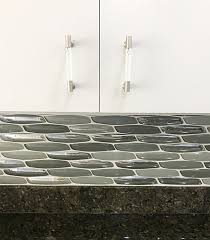 Maybe you would like to learn more about one of these? Kitchen Design Inspiration Mixing Yves Silver Mosaic Glass Tile With Stark White Cabinets And Dark Mosaic Tile Kitchen Glass Mosaic Tiles Glass Tile Backsplash