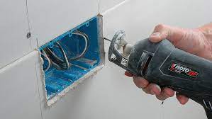 The rotary cutter head acts as both a rotary tool and a drywall cutter. Using A Drywall Router Fine Homebuilding