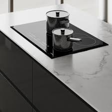 A gloss slate grey frontal perfect for modern and industrial design schemes. Clerkenwell Gloss Graphite Kitchen Fitted Kitchens Howdens