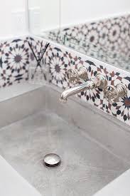 brown and black mosaic sink vanity