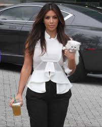 Kim Kardashian The Spawn Of Satan In My Opinion Owns One And Carries It Around With Her Leaving Another Kim Kardashian Kim Kardashian 2012 Kardashian Style