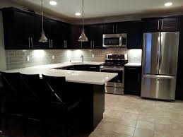 Modern gray kitchen cabinets with glass subway backsplash. Grey Glass Backsplash For Kitchen Novocom Top