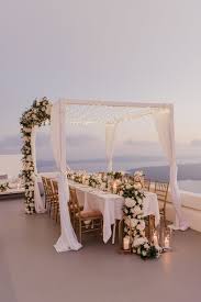If you are planning for a simplistic evening party, then you can make a handful of items at home. An Intimate Santorini Wedding That Redefines Luxury Ruffled