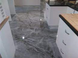 Epoxy flooring has a thickness of at least 2 millimeters. Epoxy Flooring Green Valley Specialist