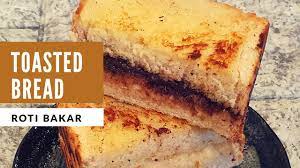 Grilled bread) is an indonesian sandwich that consists of two slices of grilled white bread and a filling, such as sugar, margarine, butter, hagelslag, chocolate spread, cheese, peanut butter. Stay Home Recipes Toasted Bread Recipe Roti Bakar Bandung Youtube