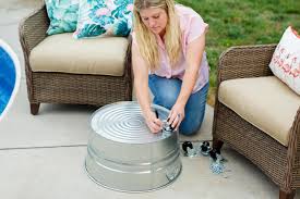 Outdoor umbrella stand patio umbrella lights large patio umbrellas table umbrella umbrella stands support parasol backyard projects diy how to make an outdoor side table from a plate and a planter | offbeat home & life. Diy Mobile Umbrella Stand Planter Hgtv