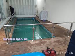 082140098998 (wa) pt mega mandiri komoditi kontraktor jasa pembuatan custom kolam renang/pool di surabaya, jakarta, bandung, semarang, jogja/yogyakarta, medan, aceh, denpasar/bali, makassar, ntt, ntb, papua/irian, indonesia. Pagar Kolam Renang Akrilik Pemasangan Di Rumah Bpk Rahmat Di Pejaten Barat Jakarta Selatan