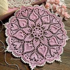 A doily (also doiley, doilie, doyly, doyley) is an ornamental mat, typically made of paper or fabric, and variously used for protecting surfaces or binding flowers, in food service gorgeous edges on this crochet doily pattern with diagram and a star in the middle. Draiguna Sweetheart Soiree