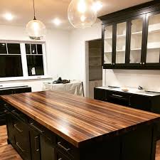 Sappy Walnut Edge Grain Island Top On Black Cabinets Walnut Woodworking Woodworkingf Black Kitchen Island Kitchen Island Tops Kitchen Island With Cooktop