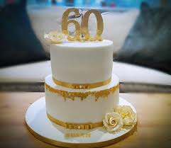 Choose 60th birthday flowers as you would for a recipient of any other age, based on their gender and their colour preferences. Bakealous Gold Leaf 60th Birthday 2 Tier Cake With Cream And Gold Flowers Birthdaycake 60thbirthday Goldleafcakes Facebook
