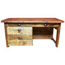 Crafted of reclaimed pine, this rustic desk is a showpiece that highlights the beauty of the wood's natural markings and organic grain while keeping a caring eye on our environment. Custom Barn Wood Desk Raised In A Barn Furniture