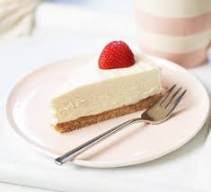 Coconut cake with white chocolate, close up. White Chocolate Cheesecake Recipe Bbc Good Food