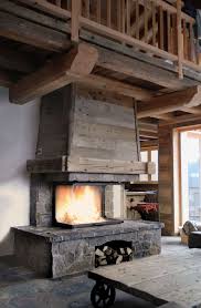 Fireplace Chalet Cheminee Chalet En Pierre De Taille Et Vieux Bois Foyer Atra 900 3 Faces Rustic Fireplaces Fireplace Design Fireplace Hearth