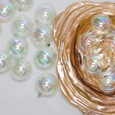 Whitehurst clear glass ornaments, 2, $34 for 28, homedepot.com; Northlight 32ct Shatterproof Iridescent Shiny Christmas Ball Ornament Set 3 25 Clear Target