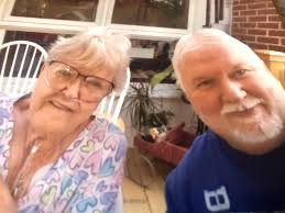 I'm looking for a special picture but for now please can you make me hug my  mum- I'm in red and she's in the middle